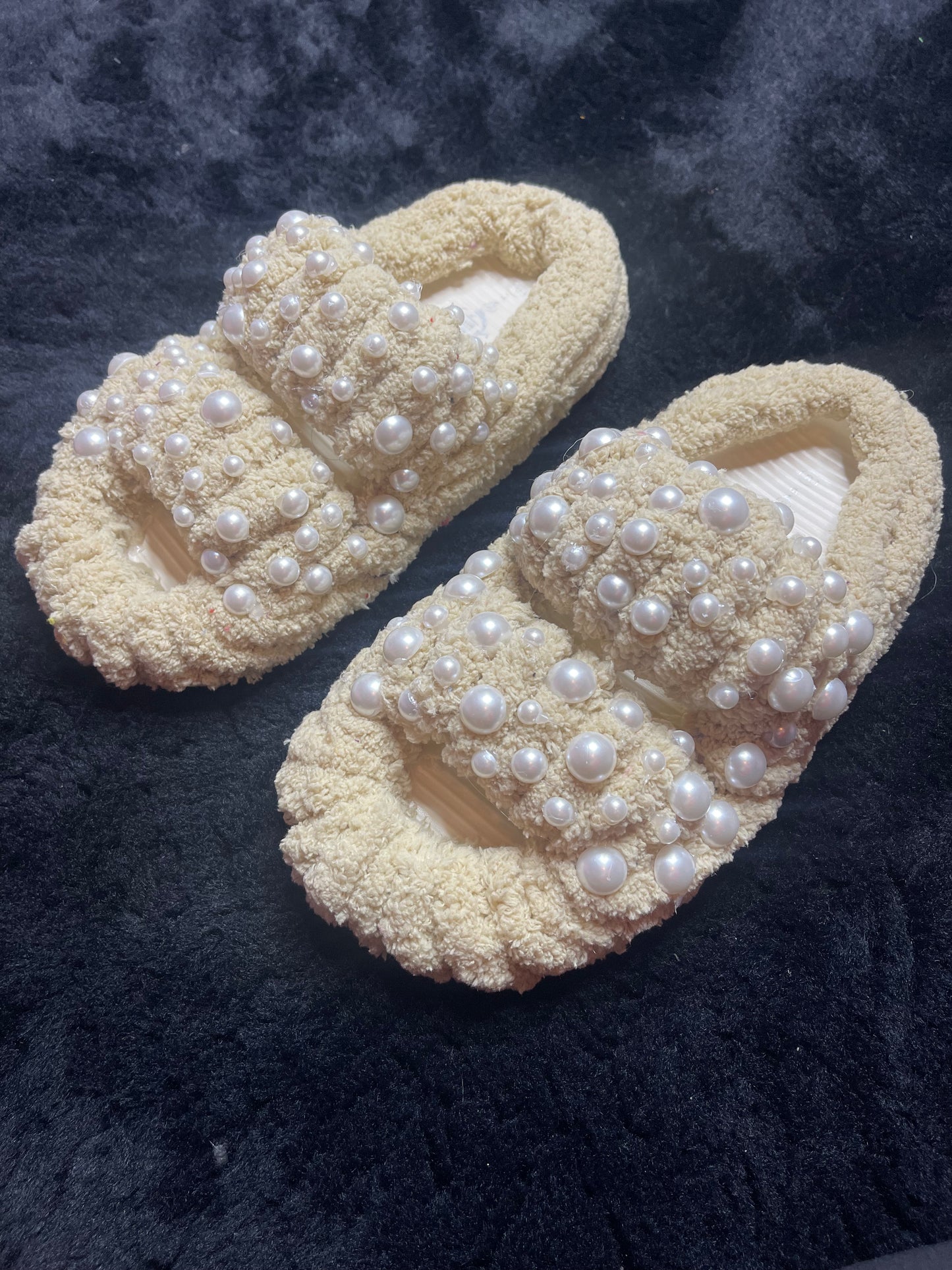 "Cozy ivory yarn slippers for women, a stylish and thoughtful holiday gift idea."