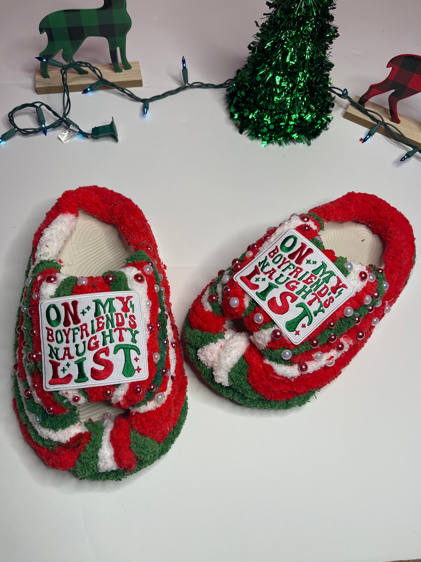 "Fun and festive Naughty List slippers, handmade for warmth and holiday cheer."