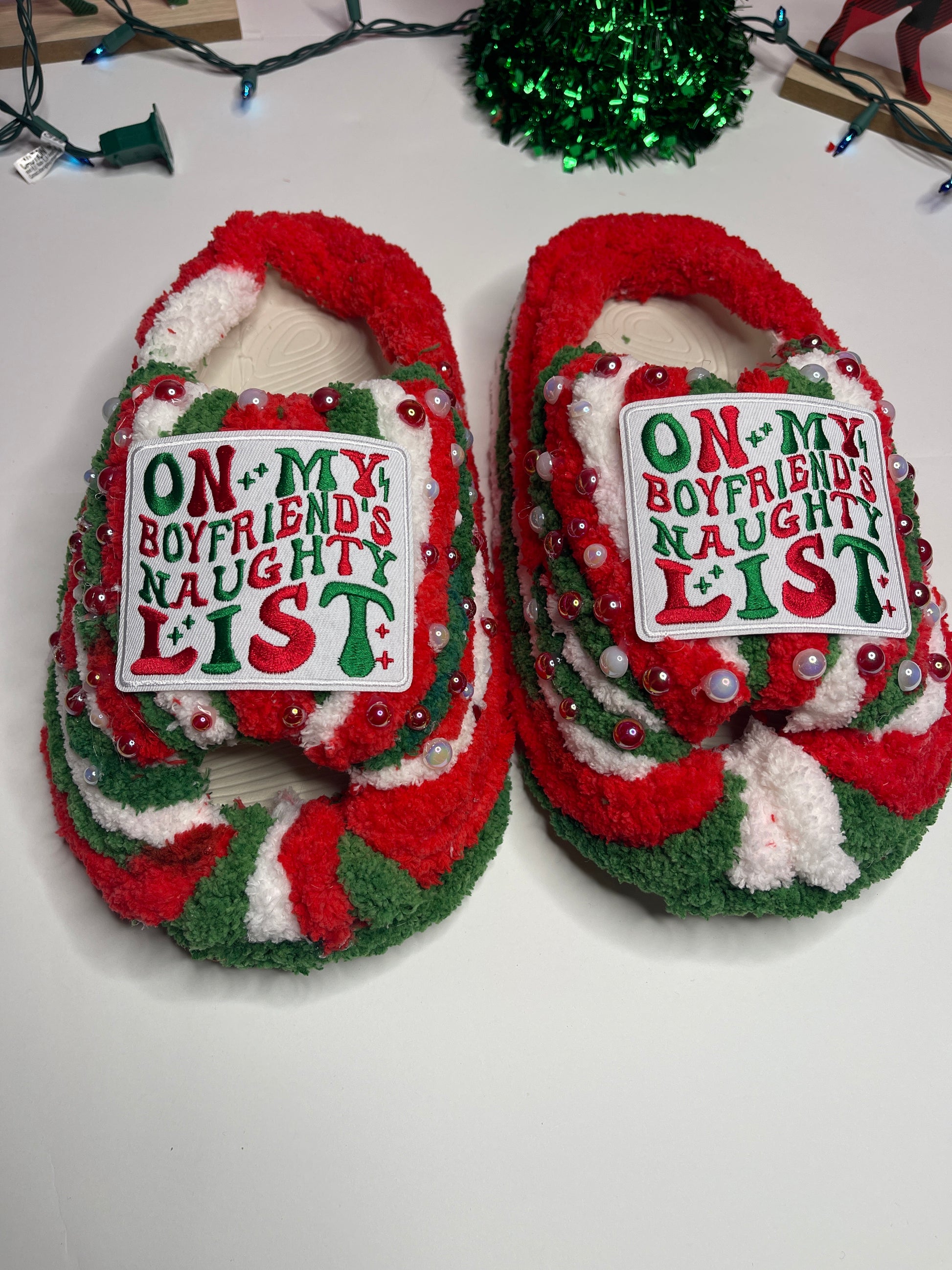 "Fun and festive Naughty List slippers, handmade for warmth and holiday cheer."