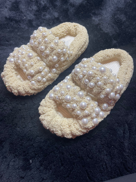 "Cozy ivory yarn slippers for women, a stylish and thoughtful holiday gift idea."