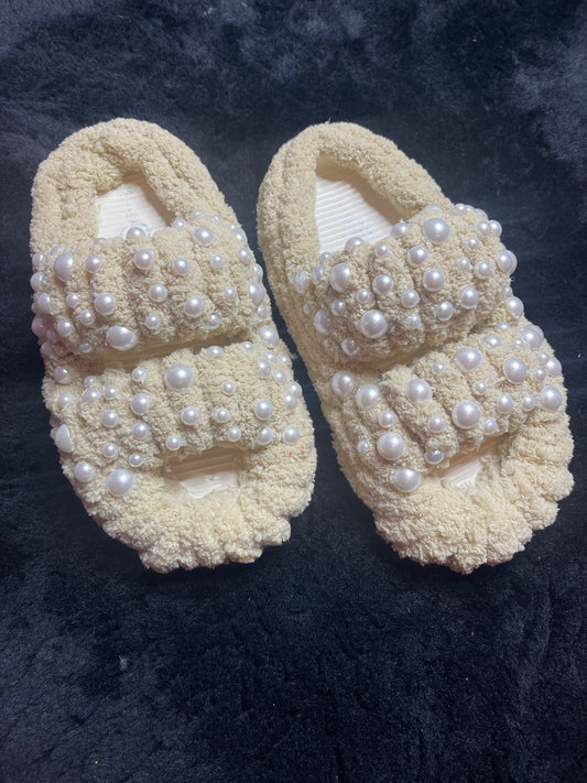 "Cozy ivory yarn slippers for women, a stylish and thoughtful holiday gift idea."