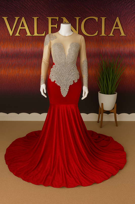Red evening gown with silver embellishments on a mannequin against a brown background with 'VALENCIA' text.
