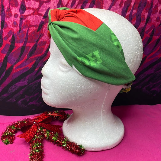 Grinch Turban Twist Headband with festive green and red design.