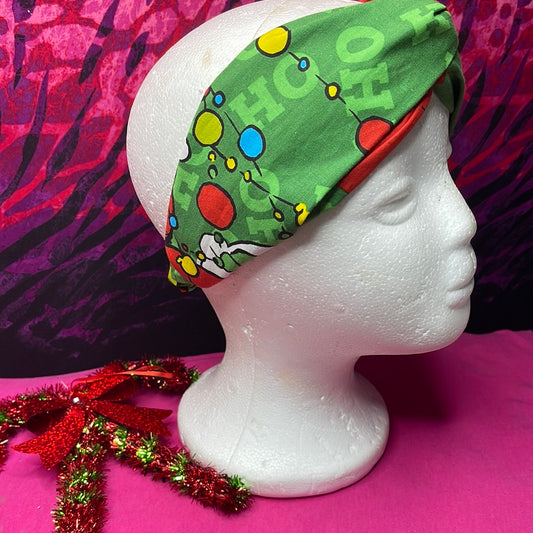 Grinch Turban Twist Headband with festive green and red design.